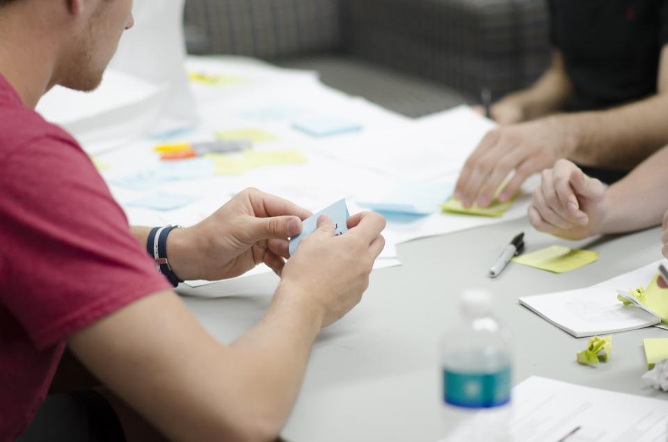 Team members planning together at a table